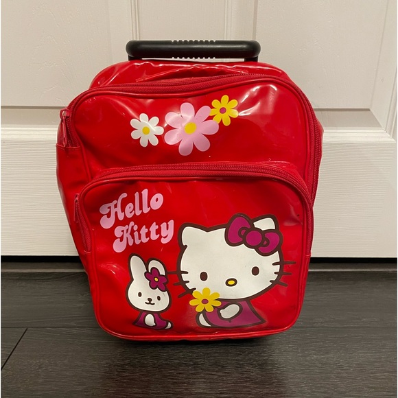 Hello Kitty 12” tall suitcase with wheels. - Picture 3 of 12